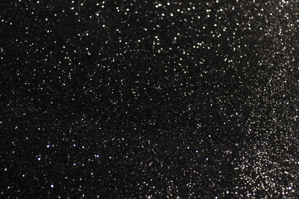 黑色表面，白色眩光和散焦。图片下载