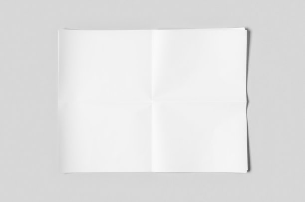灰色背景上的空白报纸模型。图片下载