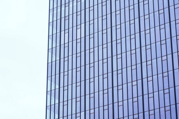 蓝色玻璃抽象纹理的现代摩天大楼。商业背景。图片下载