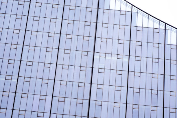蓝色玻璃抽象纹理的现代摩天大楼。商业背景。图片下载