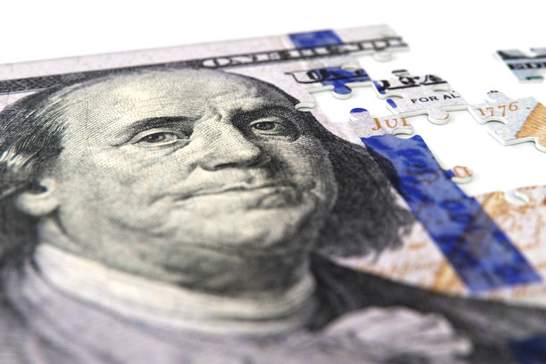 现金票据作为金融稳定的象征，美国货币拼图股票照片图片下载