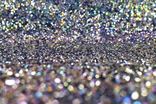 紫色的模糊背景。闪闪发光的背景。模糊前景。图片下载