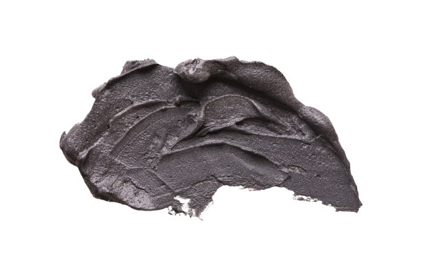 黑色粘土面膜涂抹在白色孤立的背景图片下载