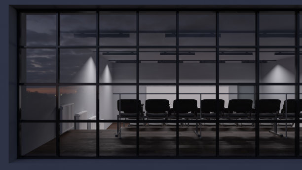 后视图的一个昏暗的照明演讲大厅后面的窗户图片下载