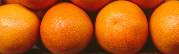 新鲜成熟的葡萄柚特写，天然健康水果图片下载