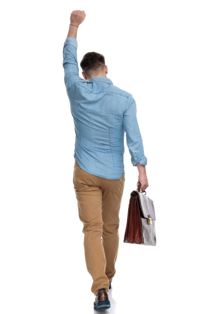 拿着公文包庆祝的休闲男士背影图片下载