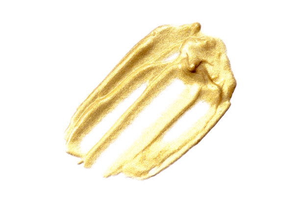 金色的笔刷在白色的背景上涂上金色的颜料图片下载