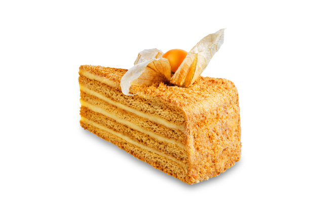 蜂蜜蛋糕焦糖奶油馅装饰酸浆在白色孤立的背景图片下载