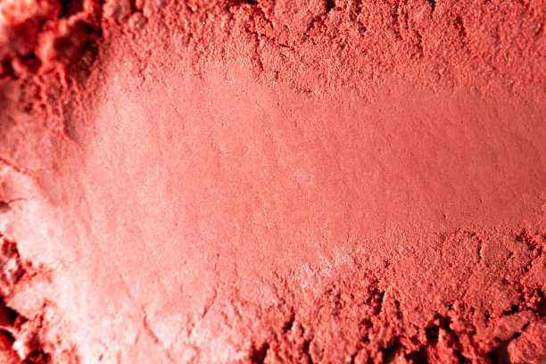 红色的腮红特写纹理与选择性焦点。宏化妆产品。美丽的背景或背景图片下载