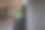 一个绿发女孩的肖像，穿着格子裙和小丑的化妆在砖墙的背景。图片下载
