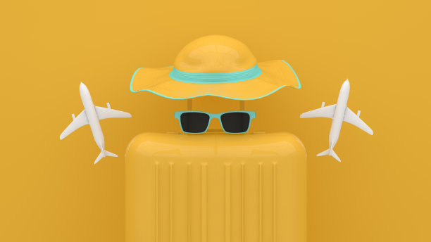 黄色背景的手提箱，简约的旅行概念图片下载