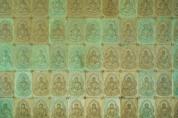 这座寺庙的墙上满是佛像。信仰佛教的概念。背景纹理,佛教图片下载