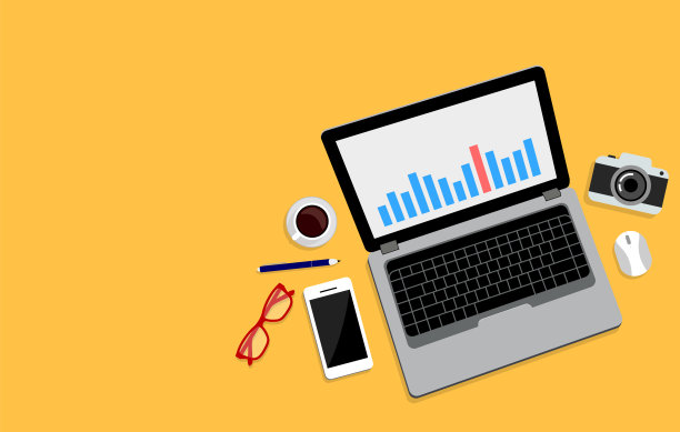 俯视图的办公室工作人员办公桌与公用事业和文具，包括笔记本电脑。图片下载