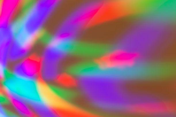 背景由不同颜色的灯光效果组成图片下载