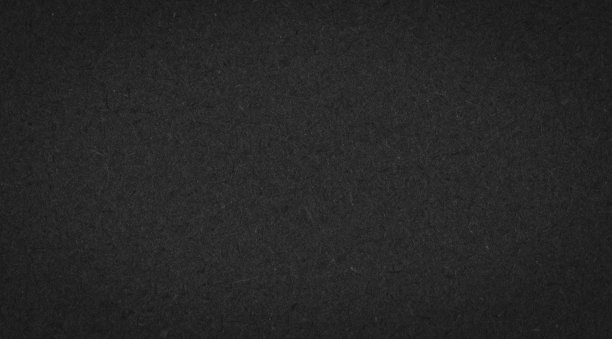 质地粗糙的黑色礼品纸带有纤维。深色背景设计，模板，贺卡，网站背景。图片下载