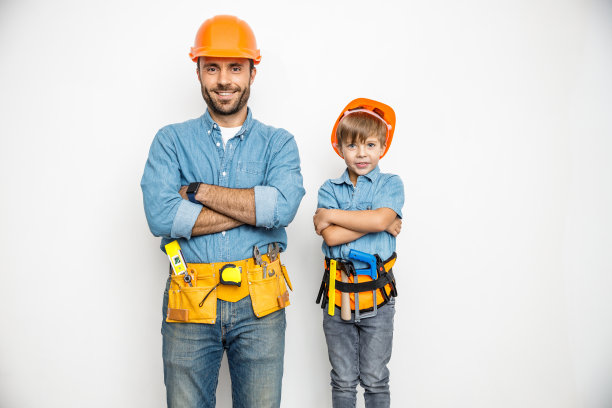 快乐的父子手持乐器库存照片图片下载