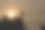 剪影图片的鸟坐在电柱上的傍晚和太阳在背景上的日落图片下载