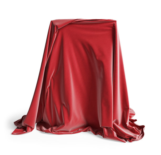 空空的讲台上盖着红绸布。孤立在一个白色背景与剪辑路径。图片下载