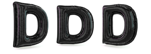 大写字母d。背景是可充气的黑色气球。3 d图片下载