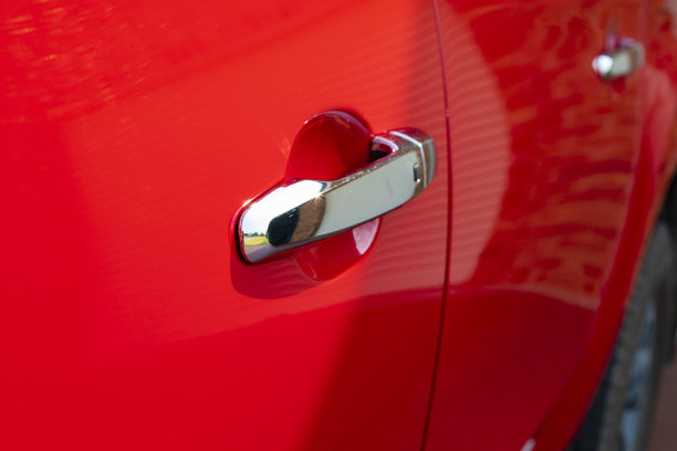 一辆红色轿车的抽象细节图片下载