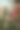 侧面的可爱的怀孕白人妇女站在家庭办公室和饮用新鲜的水。图片下载