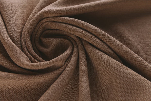 黄麻米色亚麻布桌上，在自然光下折叠图片下载