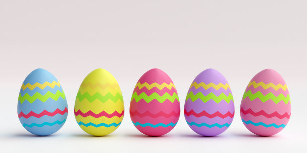 彩色的复活节彩蛋在朴素的背景上排成一排图片下载
