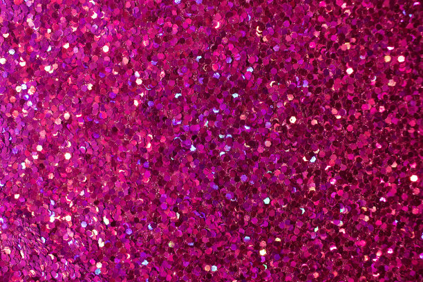 美丽的玫瑰红色五彩纸屑闪光抽象背景图片下载