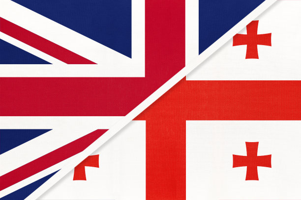 英国对格鲁吉亚的纺织品国旗。两个欧洲和亚洲国家之间的关系。图片下载