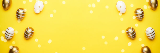 复活节彩蛋黄色背景快乐。金闪闪的篮子里装饰的鸡蛋，用于贺卡，促销，海报。图片下载
