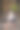 一个印度尼西亚男孩坐在自家门前的台阶上。图片下载