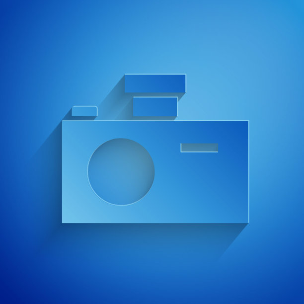 剪纸照片相机图标孤立在蓝色背景。与相机图标。纸艺术风格。矢量图图片下载