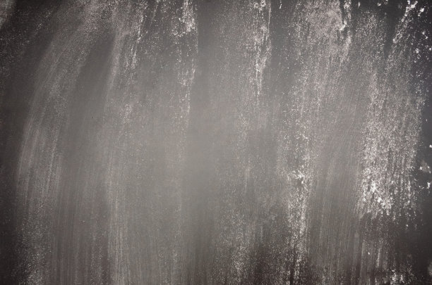 黑色石墨背景，细撒面粉图片下载