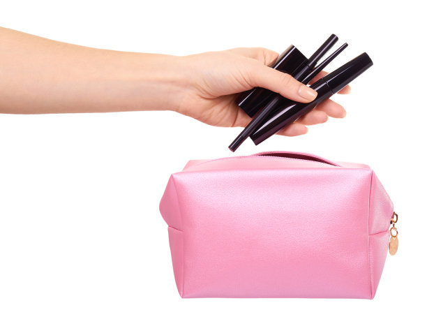粉红色的化妆包。魅力化妆品配件。图片下载
