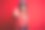 年轻美丽的黑发女摩托车手戴着摩托车头盔和红色夹克做停止唱歌与手掌。警告表情与否定和严肃的手势在脸上。图片下载
