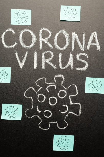 2019-ncov冠状病毒，黑板和一个危险的病毒的画，和许多贴纸。概念警告、流行病和大流行。新闻屏幕保护程序，垂直照片图片下载