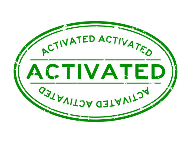 Grunge绿色激活字椭圆形橡胶印章印章上的白色背景图片下载