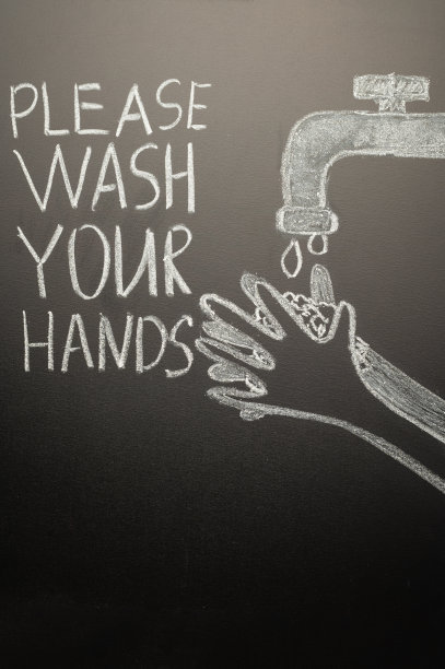 在黑板上用粉笔画一个手洗，并写上“请洗手”。冠状病毒,预防措施。图片下载