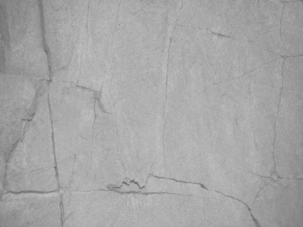 灰色的抽象背景。有裂缝的石头背景。图片下载