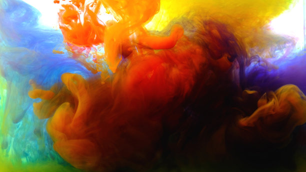 彩色水滴在水，抽象的颜色混合，墨水滴在水颜色混合涂料上彩色墨水在水图片下载