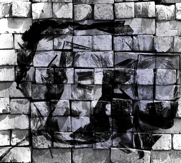 色彩斑斓的超现实的世界。虚拟涂鸦。抽象图像，画在砖墙的照片上。图片下载