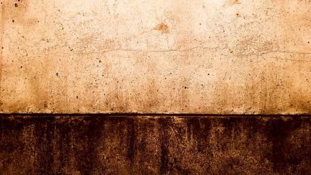 布朗黄金乏味的东西。旧大理石墙壁水泥抽象纹理的背景。空粗浅棕色混凝土墙。垃圾背景大理石纹理。枯燥乏味的图片壁纸图片下载