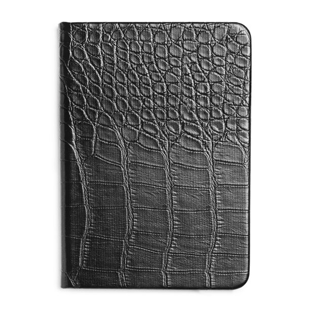 黑色皮革封闭笔记本上的白色图片下载