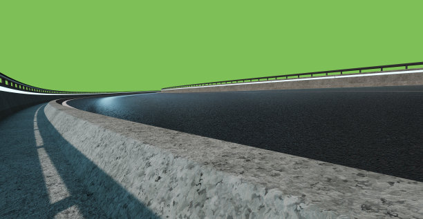 低角度的曲线柏油路在晚上图片下载