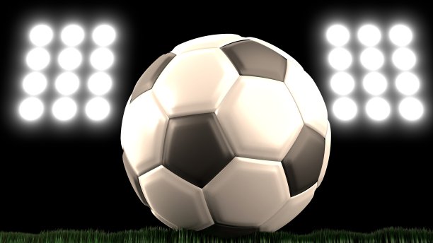 一个在泛光灯下的绿色草地上的足球的3D插图图片下载