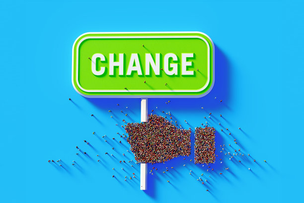 蓝色背景下的人群牵手形成绿色道路标志图片下载