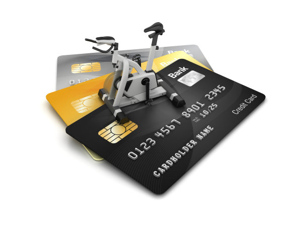 信用卡与锻炼自行车- 3D渲染图片下载