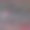 不同直径的球体，粉红色和绿松石颜色和他们的反射随机位于一个杂色的背景。抽象的幻想。图片下载