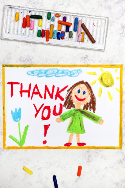 彩色图画照片:微笑的年轻女子和手写字母短语谢谢你图片下载