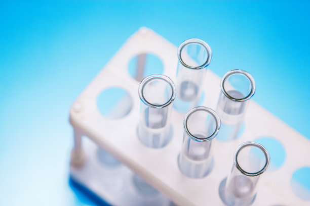 蓝色背景下的试管图片下载